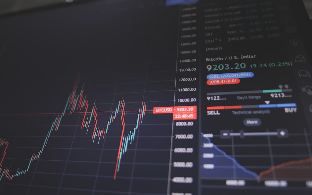 Graphique Bitcoin sur écran pour illustrer l’impact des actifs numériques sur AXA, l’assurance et les marchés financiers